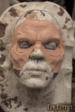 Zombie brow uden blod eller ansigtsmaling på et modelhoved set forfra